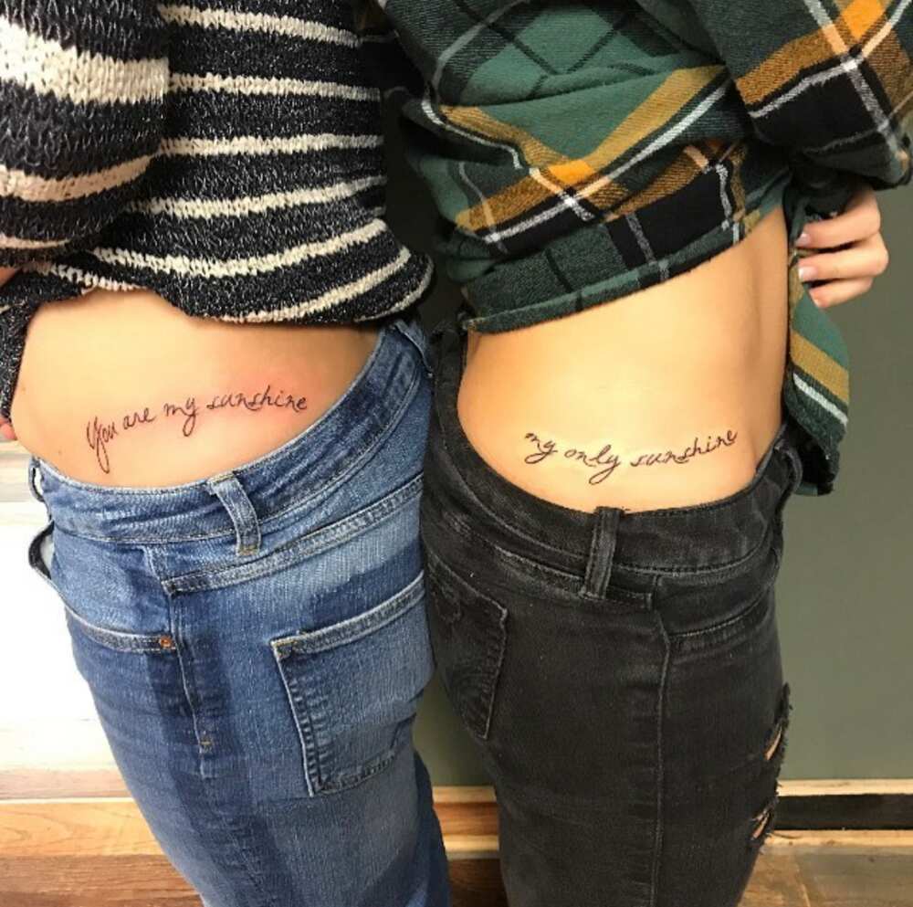Mom and daughter tattoos