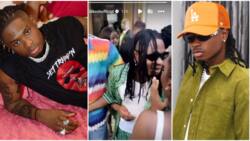 "They get boyfriends o": Trending video of ladies struggling to touch and hug Lil Kesh causes a stir