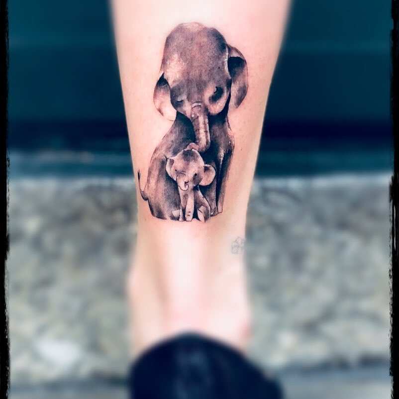 Baby Elephant Cartoon Tattoo - Ace Tattooz