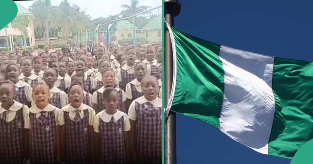 School children singing old Nigerian national anthem.