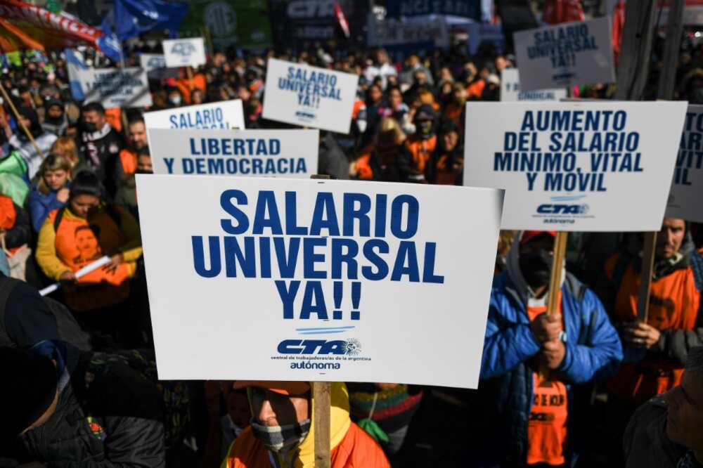 Members of social organizations march to Plaza de Mayo square in Buenos Aires demanding a universal basic salary and social aid amid the growing inflation in Argentina