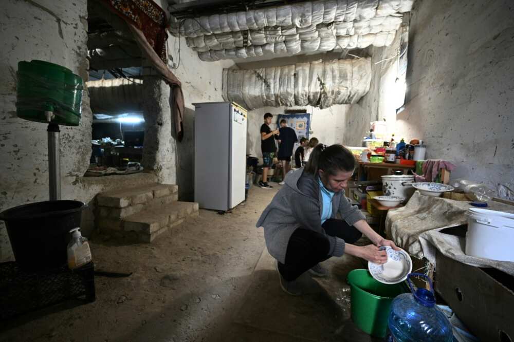 Some Saltivka residents have moved into a cavernous, gloomy shelter below the local school
