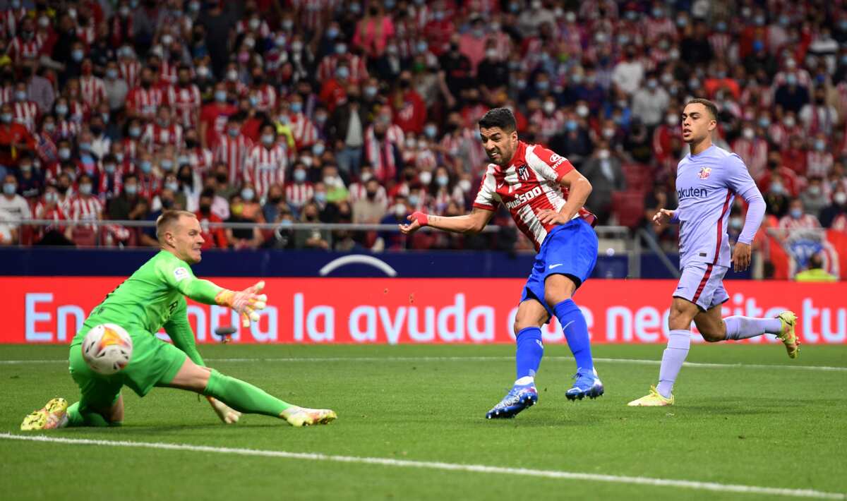 Luis Suarez scores as Atletico Madrid punish Barcelona in Spanish La Liga battle