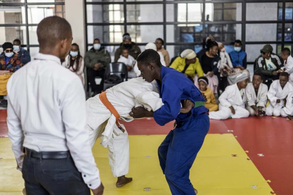 Denzel Shumba (R) said judo helped him become a more respectful, peaceful person and learn a valuable skill