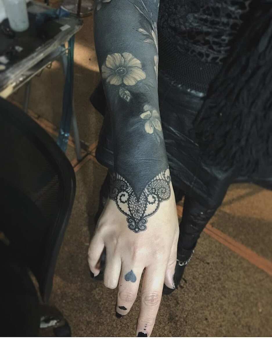 Blackout sleeve tattoos