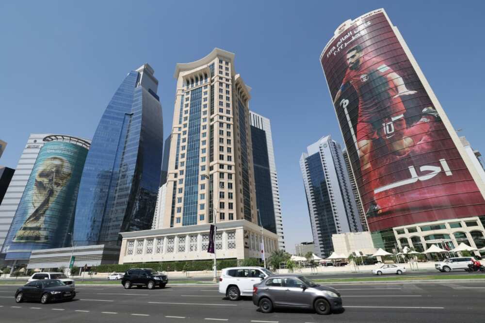 Ahead of the football World Cup, a banner shows Qatar's forward Hassan al-Haydos, in the capital Doha