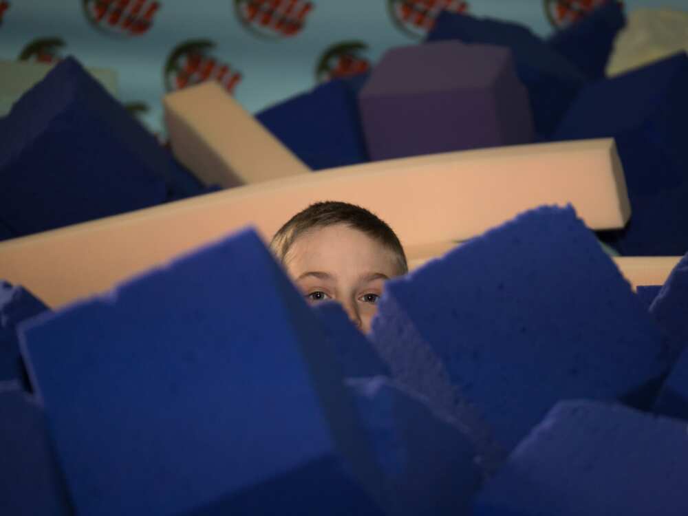 Head of a boy can see between the cubes