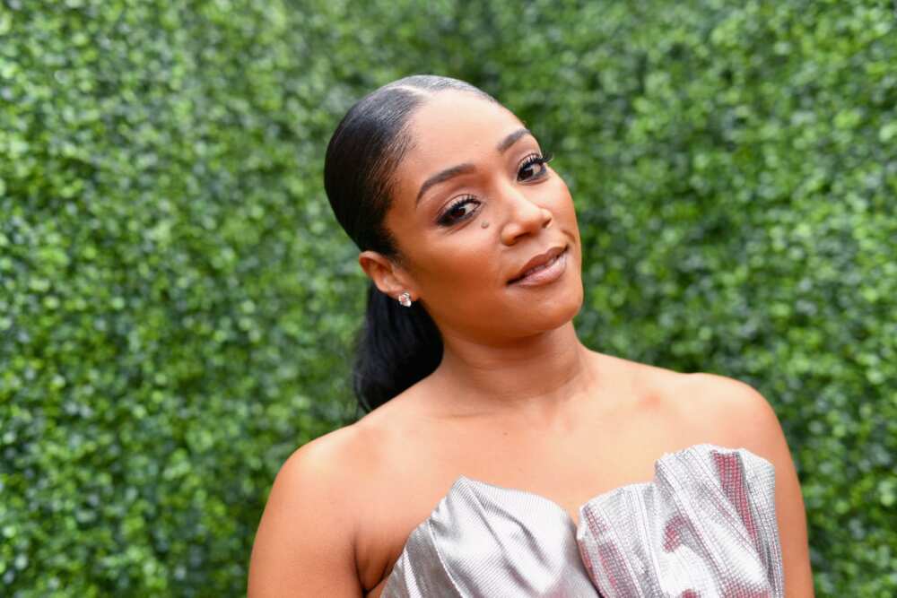 Host Tiffany Haddish astatine  the 2018 MTV Movie And TV Awards astatine  Barker Hangar connected  16 June 2018 successful  Santa Monica, California.