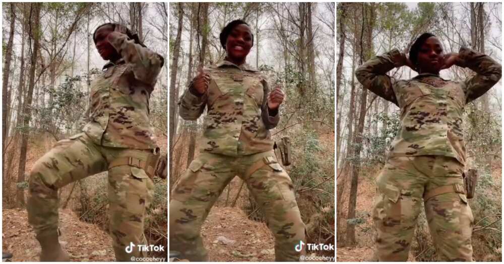 Female soldier dancing inside a bush, female soldier dance, bush, US