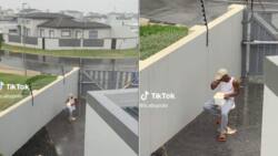Trending video shows man sadly licking ice cream while sitting in rain, causes huge stir online