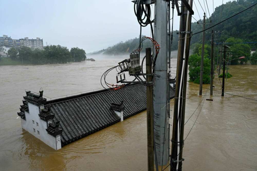 Floods have forced the evacuation of hundreds of thousands of people across southern China