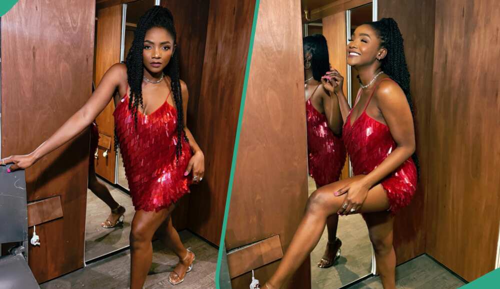 Simi wearing a red dress