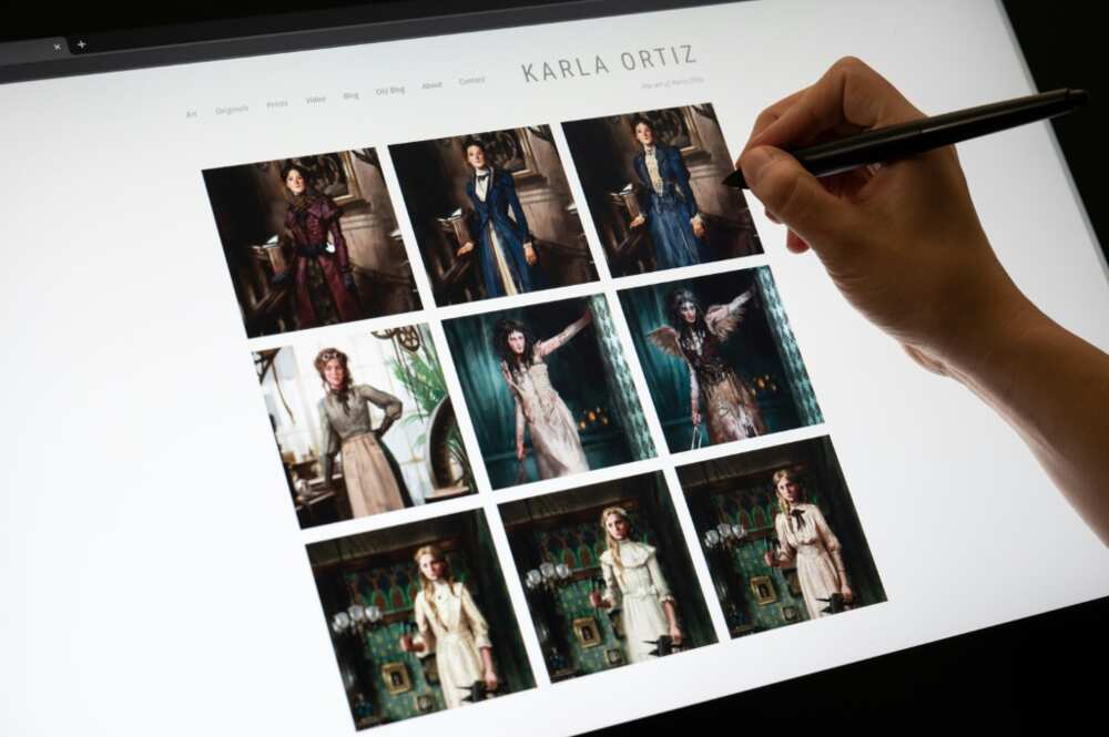 Karla Ortiz shows her website, where some of her designs and illustrations are displayed Karla Ortiz shows her website, where some of her designs and illustrations are displayed