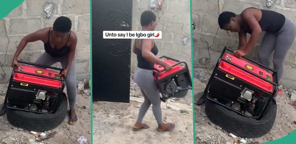 Lady lifts generator by herself.