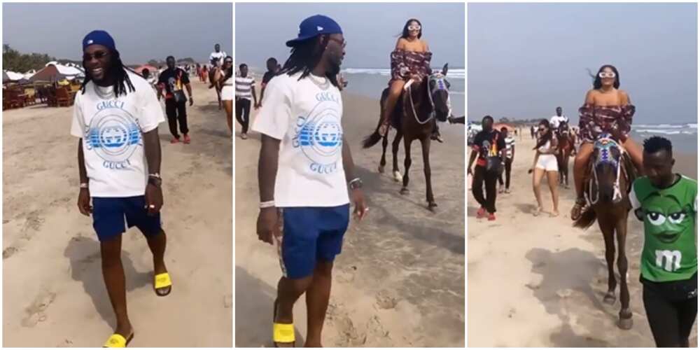Sweet video of Burna Boy guarding girlfriend Stefflon Don as she goes horseriding in Ghana