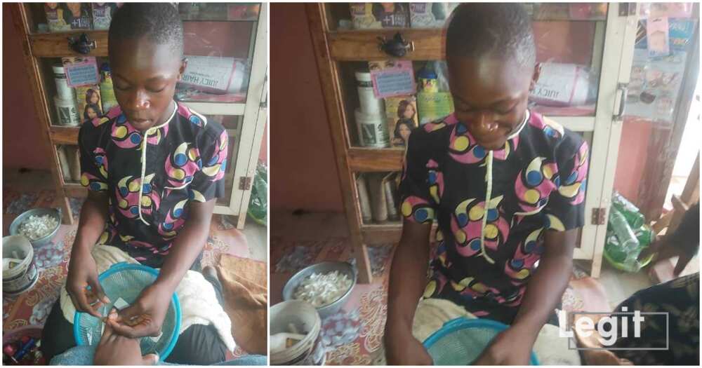15-year-old boy fixing nails for women