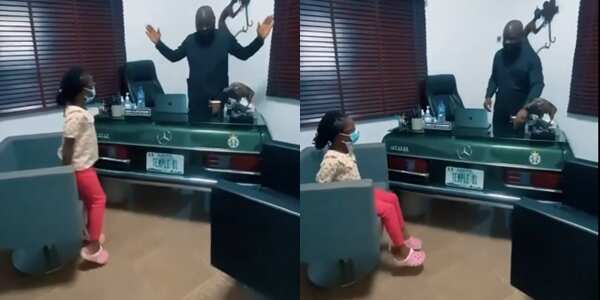 Another Level: Nigerian Man Sighted in Lagos Using the Boot of Mercedes 200 As Office Table, Many React