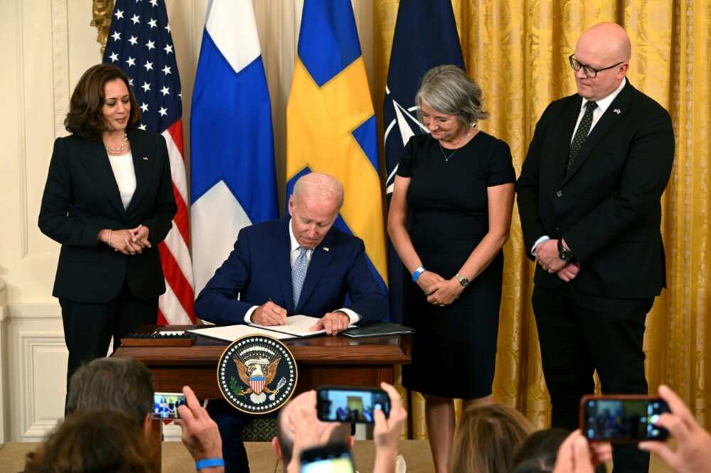 President Joe Biden flanked by Vice President Kamala Harris and the ambassadors of Sweden and Finland, says NATO expansion is a response to Russia's Ukraine invasion