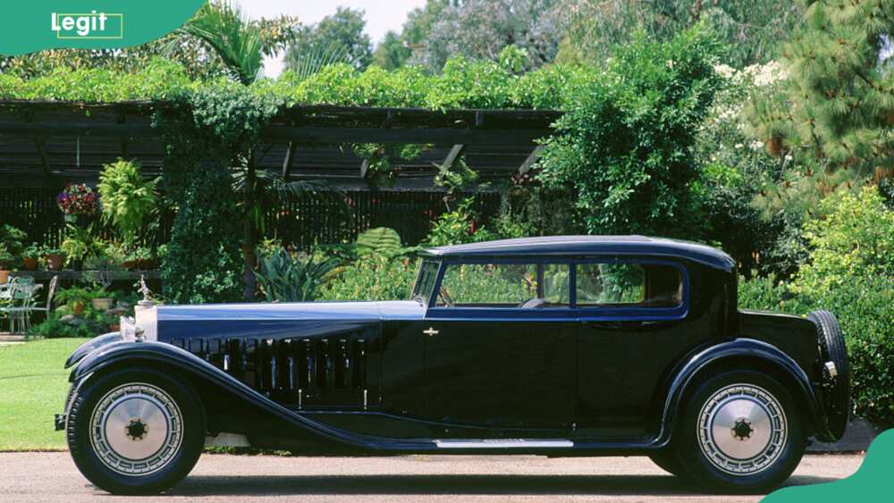 1927 Bugatti Type 41 Royale, 2000 parked outside a beautiful greener environment