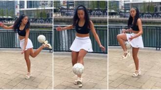 Pretty lady in short skirt plays football while wearing heels, hot video goes viral and stirs mixed reactions