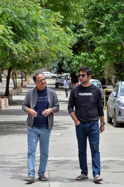 Pranay Pathole's father, Prashant Pathole (L), treated him to a celebratory dinner the first time tech billionaire Elon Musk publicly replied to him on Twitter