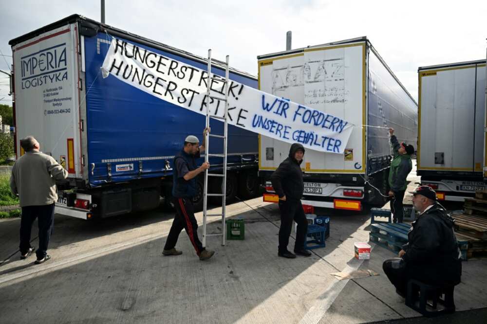 They are demanding 500,000 euros ($530,000) in what they say are unpaid wages They are demanding 500,000 euros ($530,000) in what they say are unpaid wages