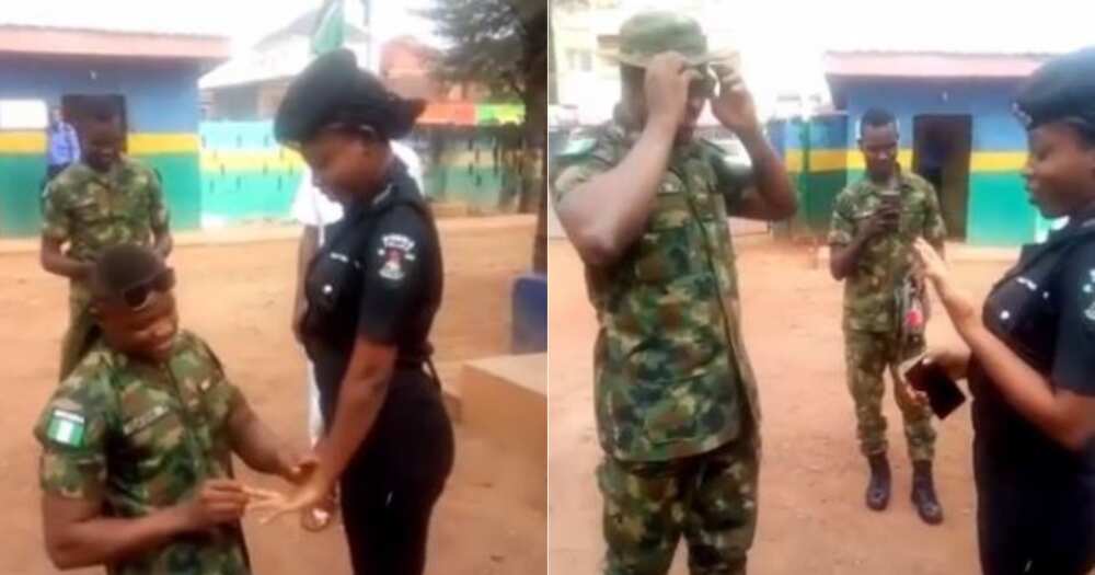 Hearts melt as Nigerian soldier publicly proposes to beautiful police woman (video)