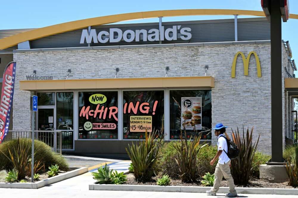 A McDonald's restaurant in Garden Grove, California, seen on July 8, 2022, with a big 'Now McHIRING!' sign in the window