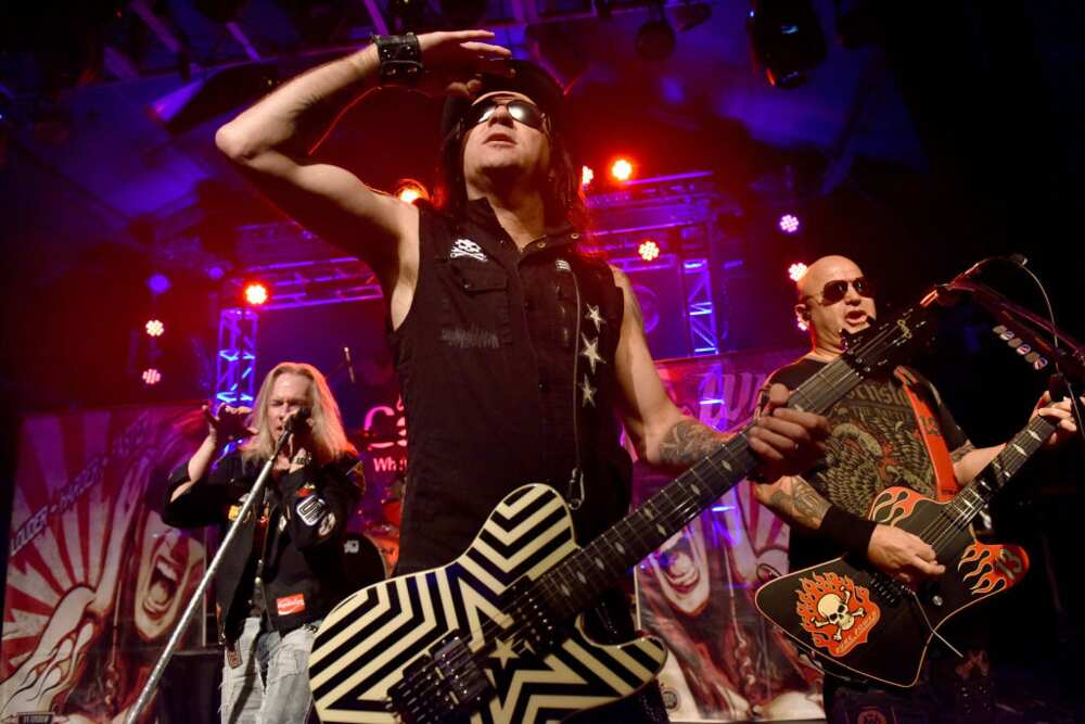 Musicians Robert Mason, Erik Turner and Joey Allen of Warrant perform during Frontiers Rock Holiday Bash at The Canyon Club