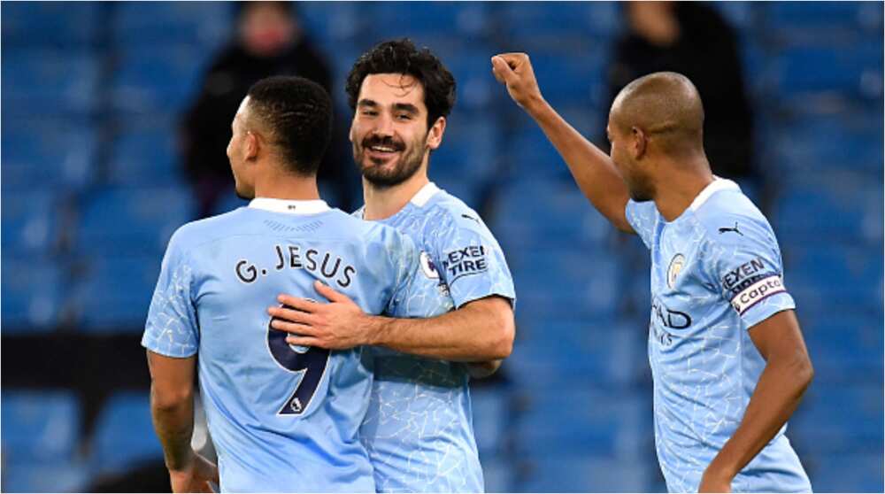 See hilarious moment Man City star stopped teammates from hugging in goal celebration as he's called Covid officer (video)