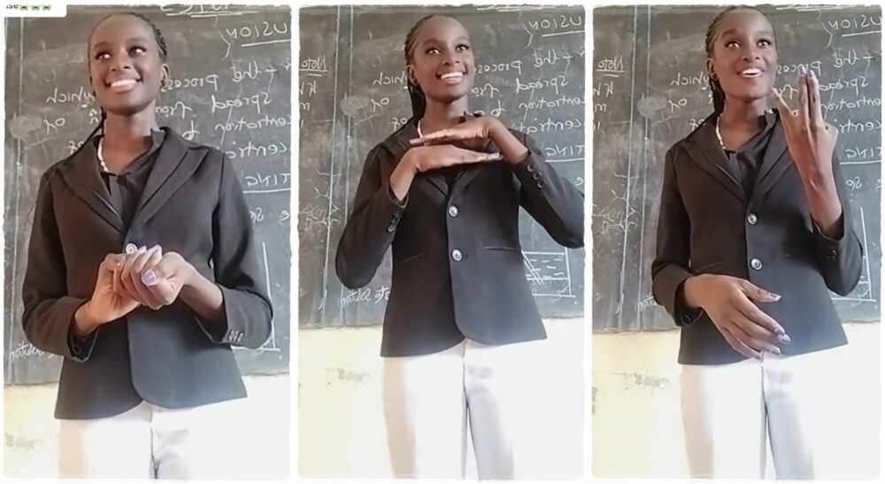 A school teacher teachers deaf students physics.