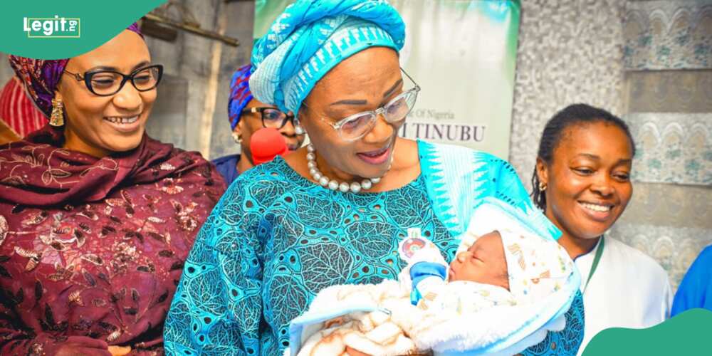 First Lady Oluremi Tinubu holding Abuja's first baby of the year