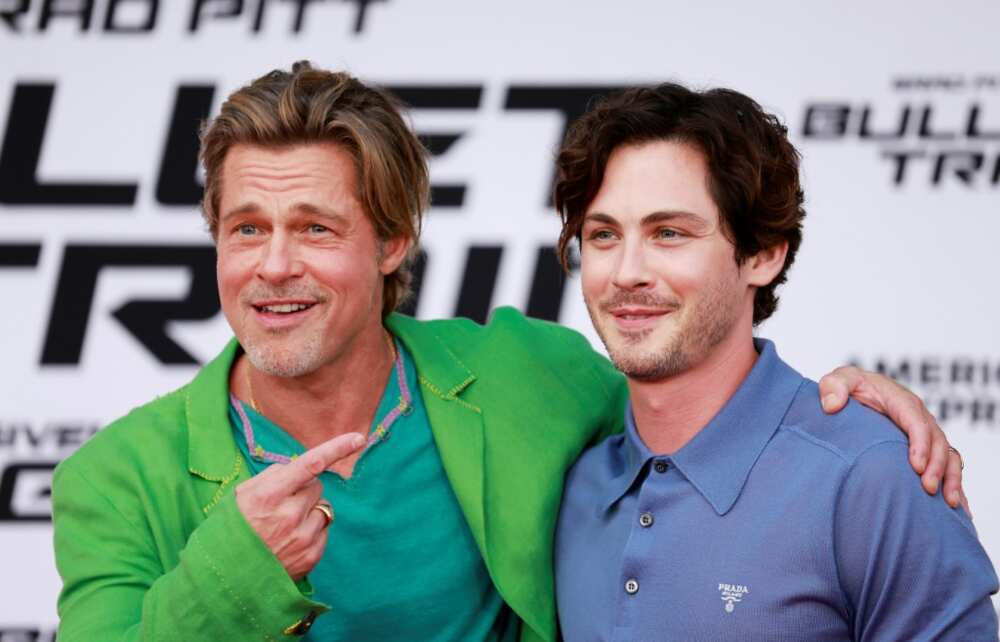 US actors Brad Pitt (L) and Logan Lerman attend the Los Angeles premiere of "Bullet Train" in Westwood, California