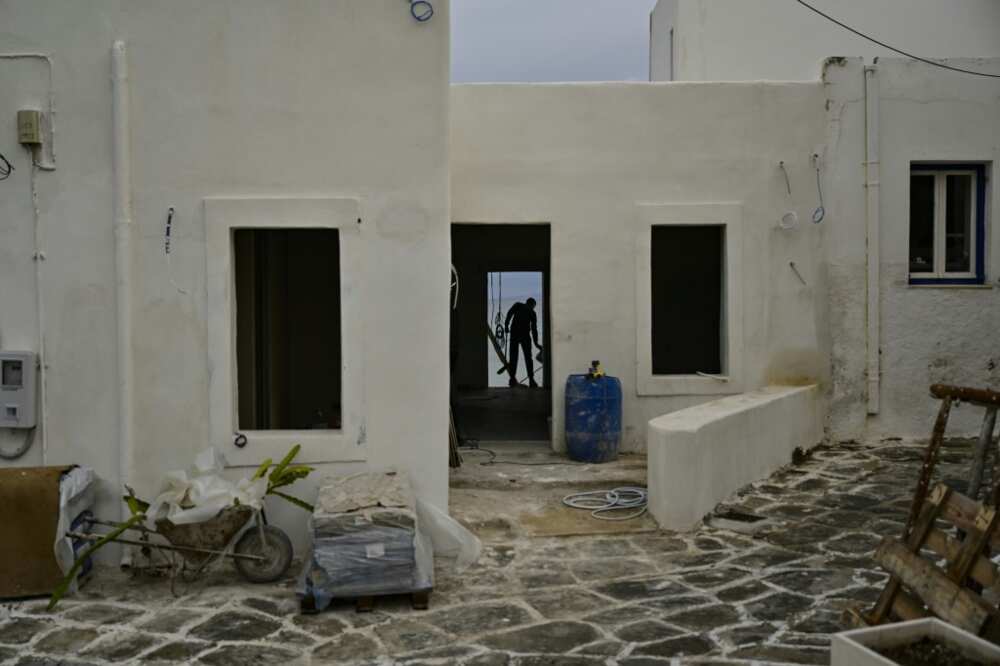 Workers busy on a site on the Greek island of Paros