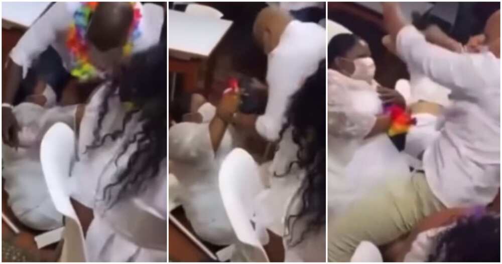 Lady falls during dance with her man, lady crashes to the floor, breaks a chair