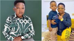 This is suspicious, why isn't he standing? Hilarious reactions as actor Aki kneels beside son for a photo