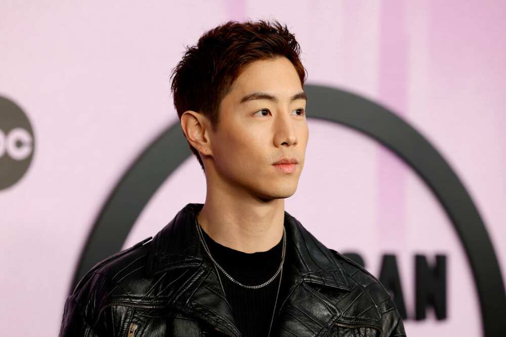 Mark Tuan attends the 2022 American Music Awards at Microsoft Theater