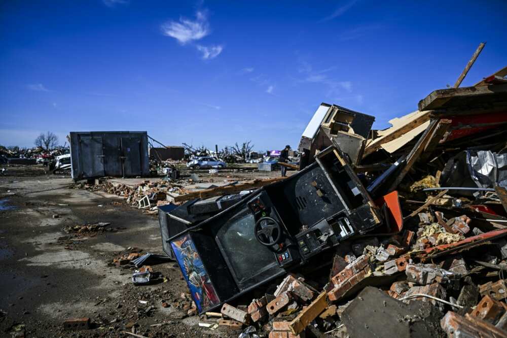 Debris from Chuck's Dairy Bar and other nearby buildings, destroyed in a tornado, are seen in Rolling Fork, Mississippi