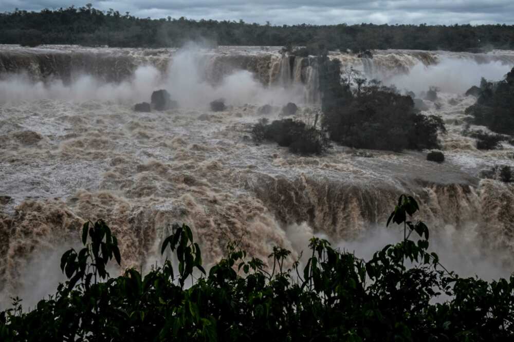 Iguazu, among the world's biggest waterfalls, has nearly 10 times the usual water volume after heavy rains in southern Brazil