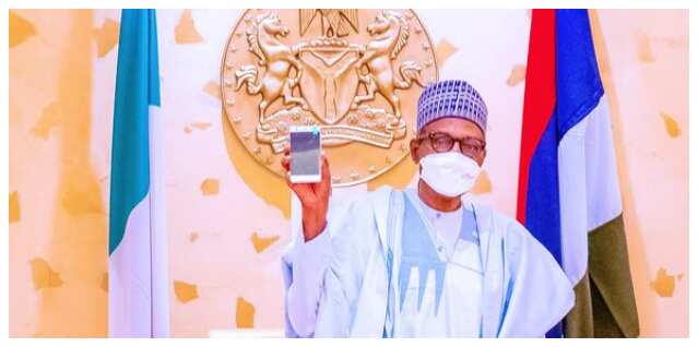 Breaking: Photos emerge as Buhari gets first made-in-Nigeria mobile phone