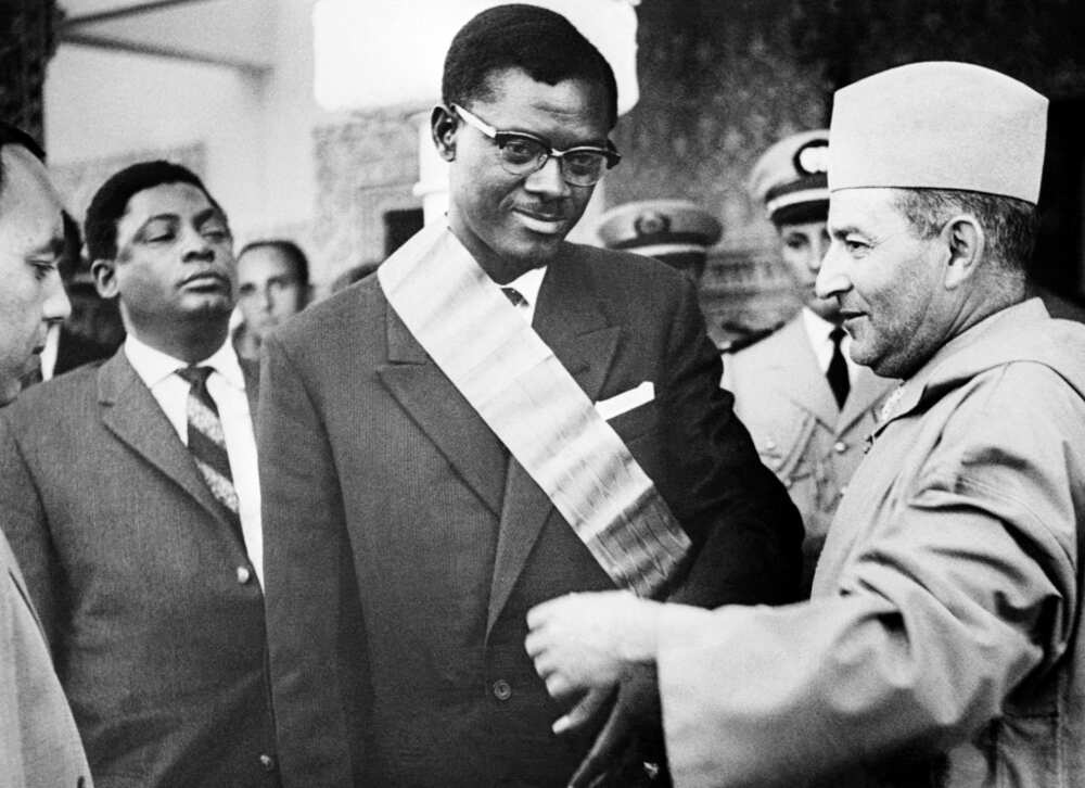Morocco's late king Mohamed V decorates Patrice Lumumba in Rabat on August 8, 1960