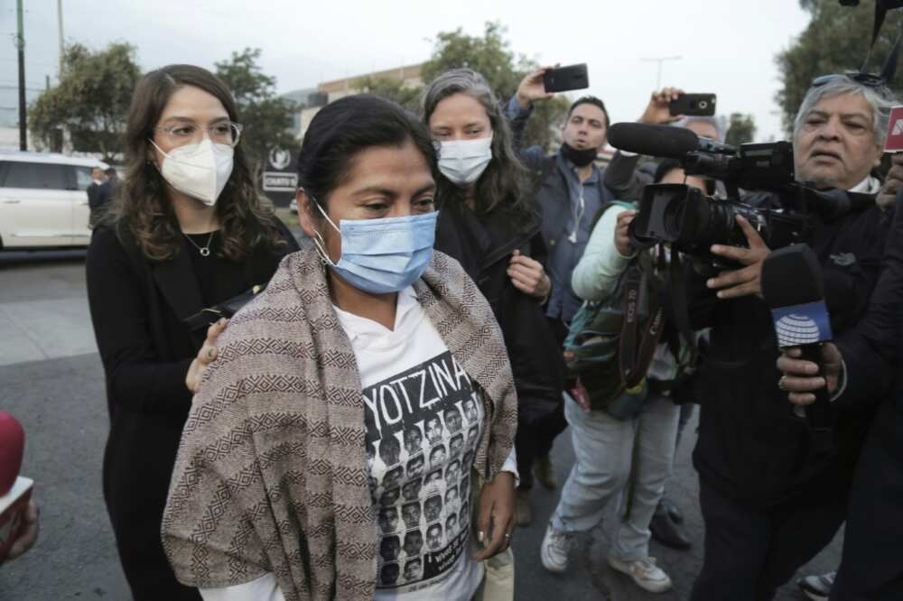 A relative of one of 43 Mexican students who disappeared in 2014 arrives for a court hearing at which a former attorney general was ordered to stand trial in connection with the case A relative of one of 43 Mexican students who disappeared in 2014 arrives for a court hearing at which a former attorney general was ordered to stand trial in connection with the case