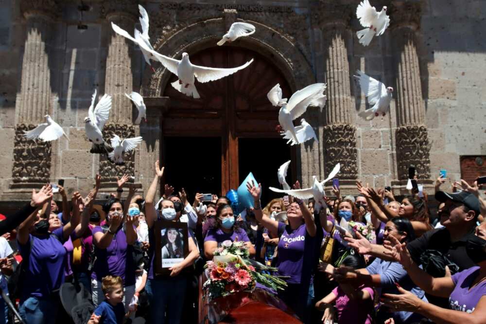 Friends and relatives of Luz Raquel Padilla, a Mexican activist and mother of an autistic child, attend her wake in Zapopan after she was set on fire and died