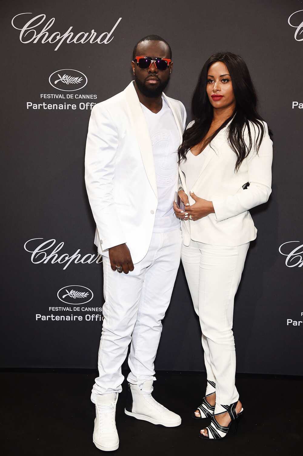 Maître Gims et son épouse DemDem assistent à la soirée Chopard au 69e Festival de Cannes le 16 mai 2016 à Cannes, France. (Photo par Stéphane Cardinale - Corbis/Corbis via Getty Images)