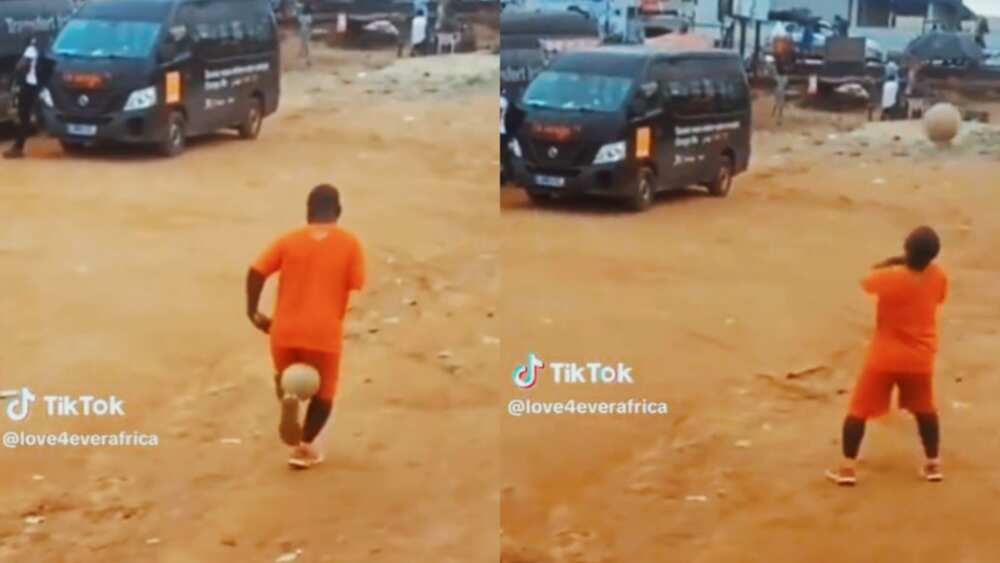 People cheer as they watch display his football talent