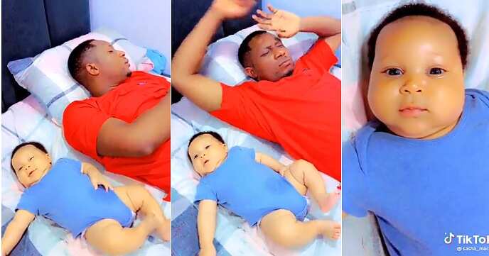 Video trends as babysitting father sleeps off before baby, mum sees them