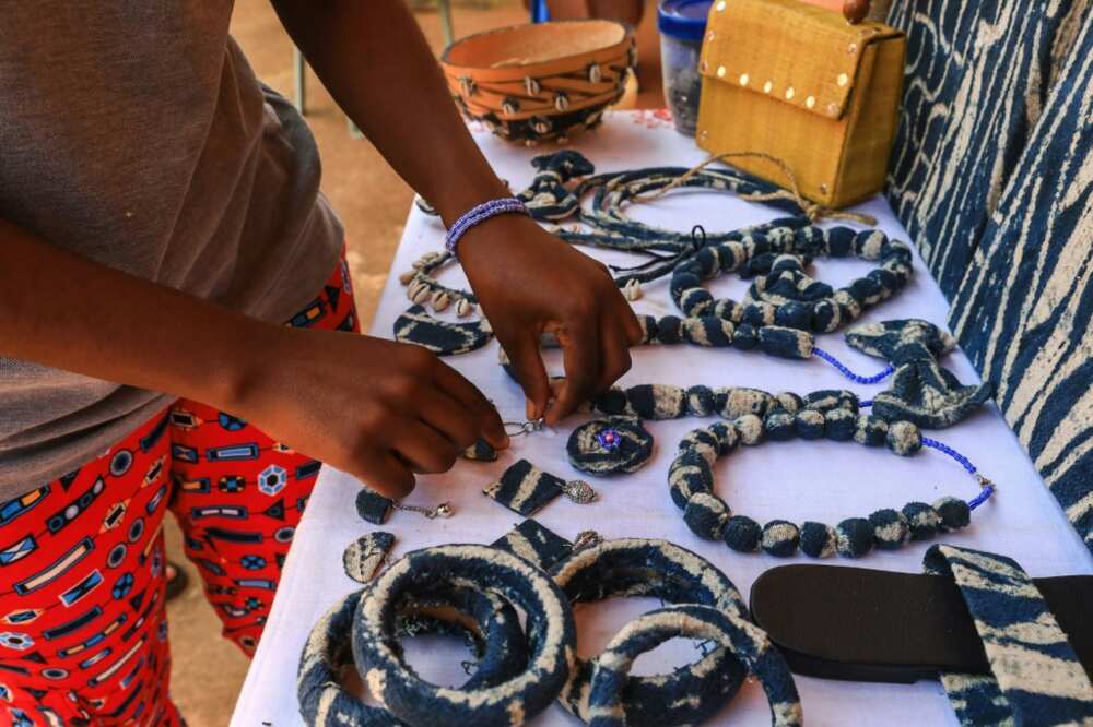 Some local creators like this one in Bafoussam have taken inspiration from ndop patterns in their work Some local creators like this one in Bafoussam have taken inspiration from ndop patterns in their work