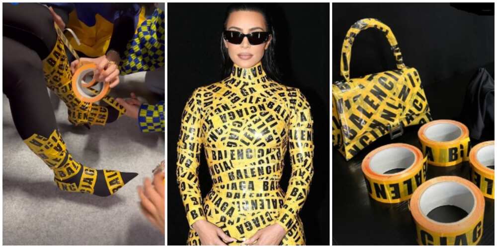 Kim Kardashian Attends The Balenciaga Show Wrapped In Yellow Tape