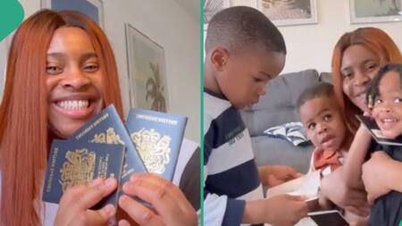 Nigerian woman rejoices as she and her two children become british citizens, get their passports