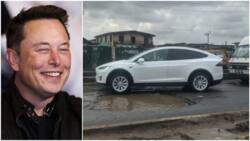 Photo shows expensive Tesla electric car trying to avoid big pothole in Lagos, Nigerians give funny reactions